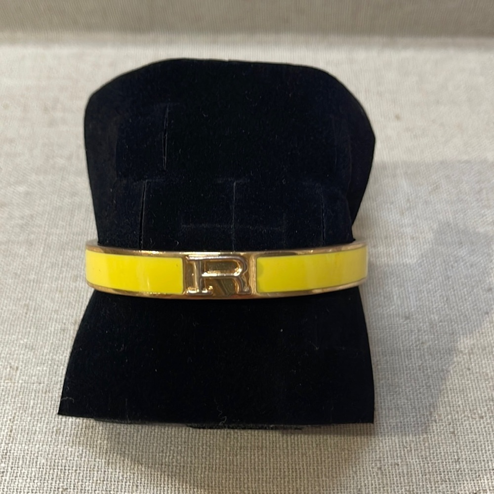 C. WONDER INITIAL R BANGLE